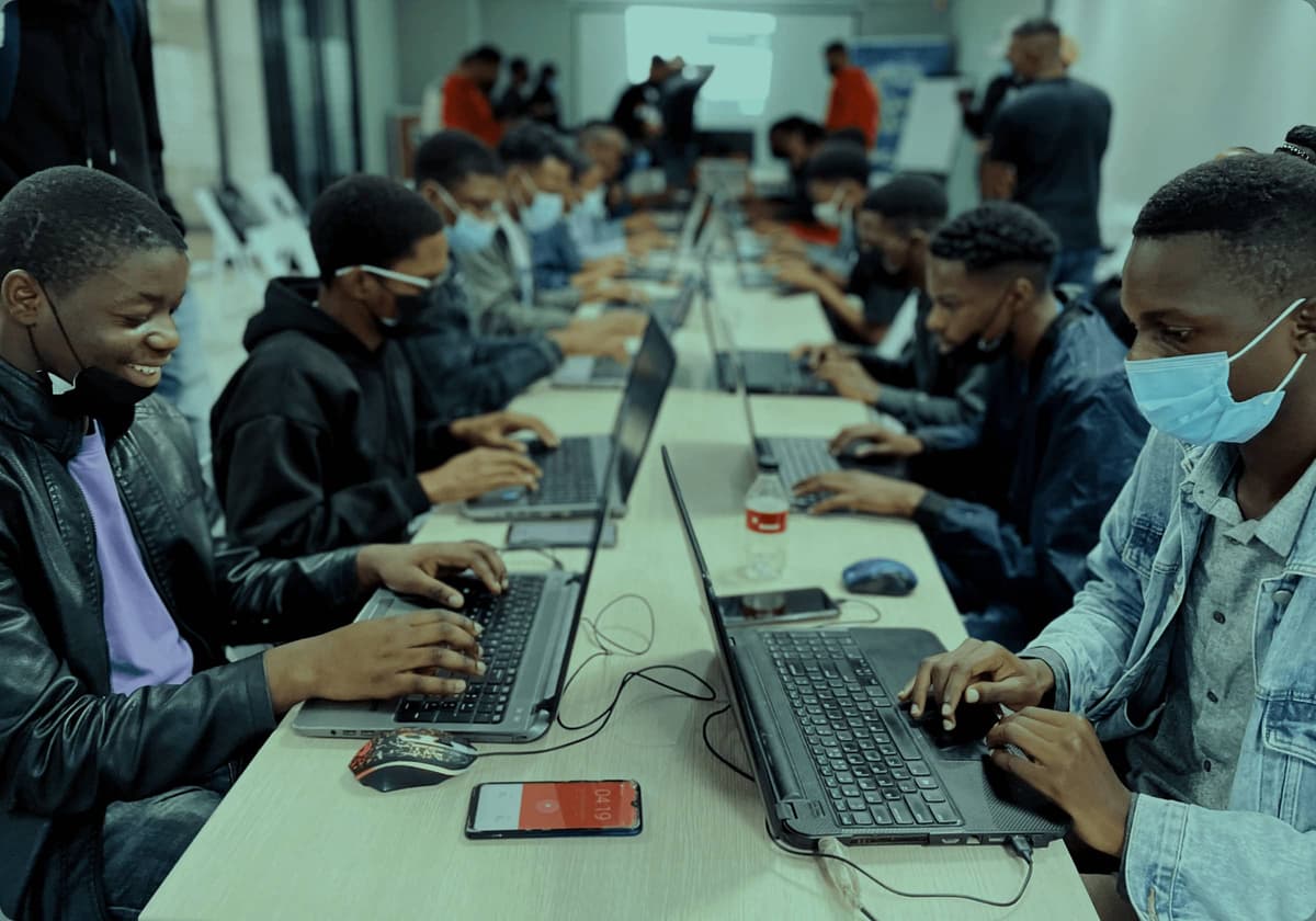 People coding together - Code In The Dark