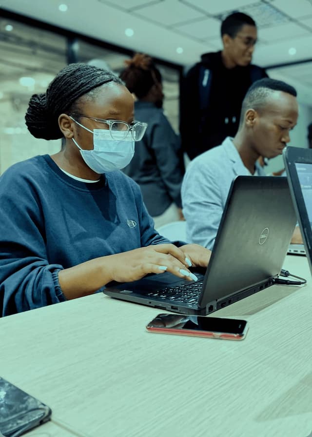 Girl with mask coding - Code In The Dark